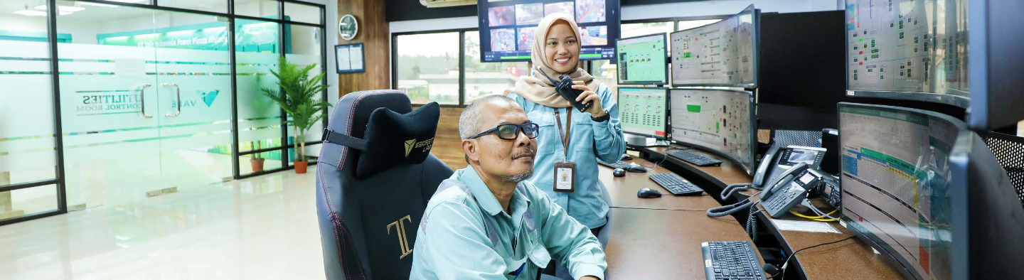 Indonesia employees in front of computers in one of the work sites.