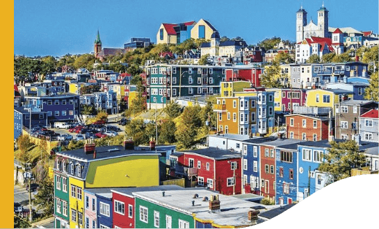 View to St. John’s with different colorful houses/buildings.