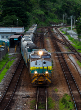 wo rectangular images separated by a small blank space. The first is an aerial image of a Vale train switching tracks. The second is a photo of the front of the first cabin of Vale freight train.